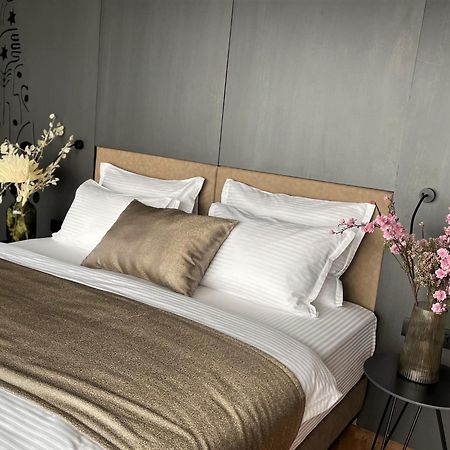 Arka Art Hotel Kashari 外观 照片 A bed with bed linen