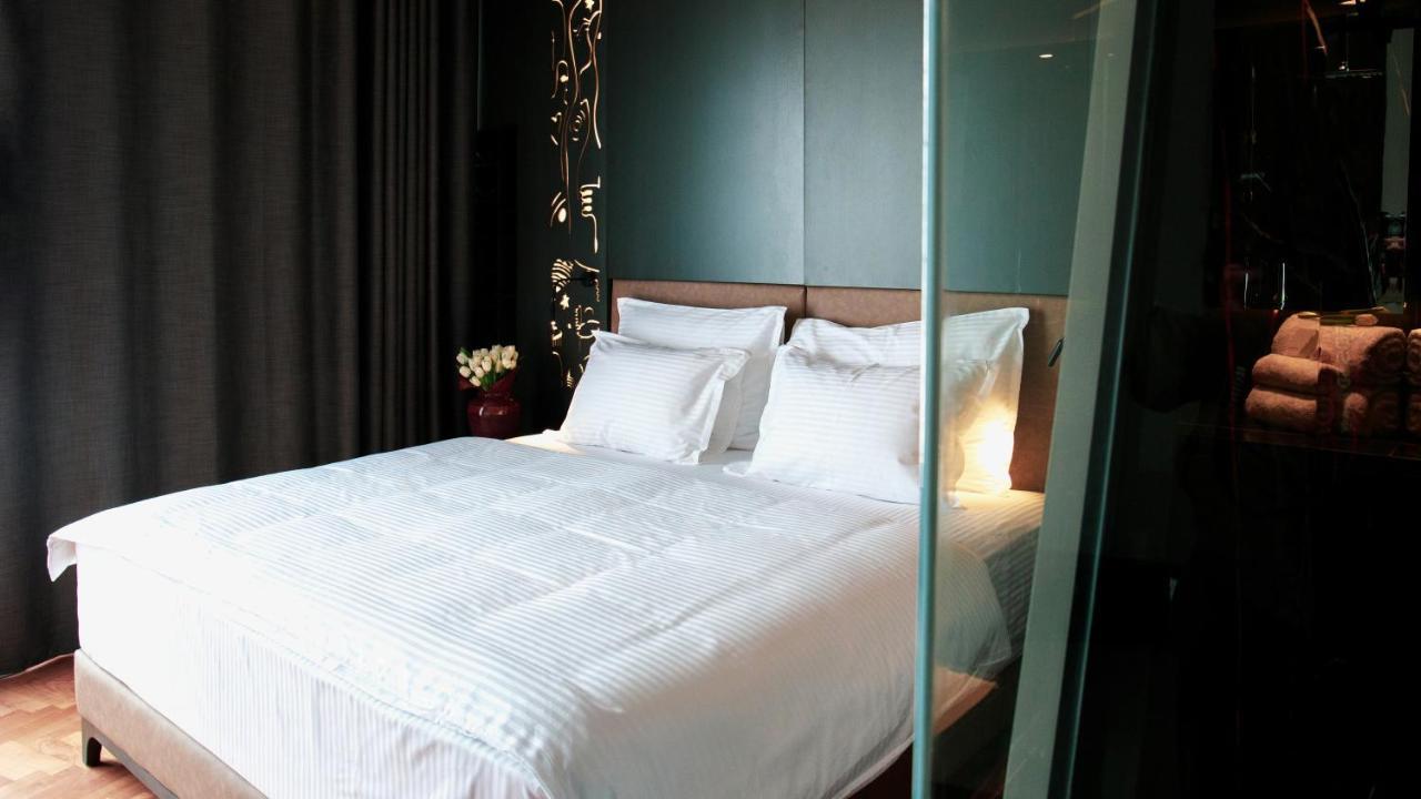 Arka Art Hotel Kashari 外观 照片 A bed with white sheets